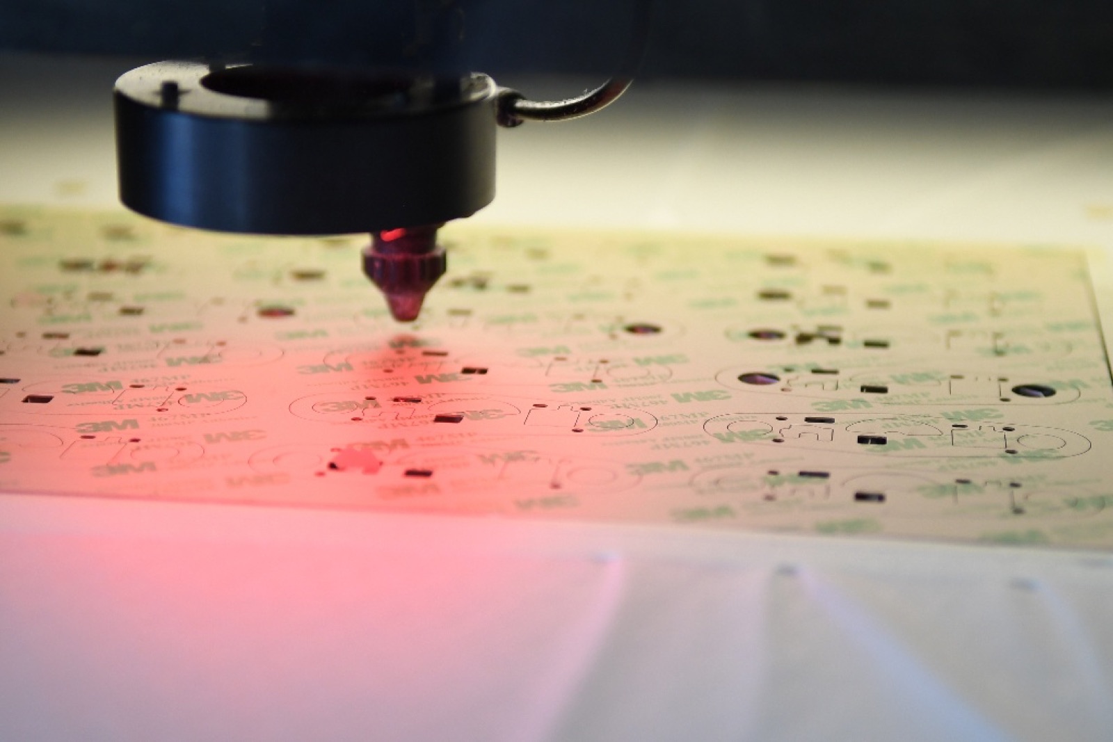 Laser die cutting station in operation