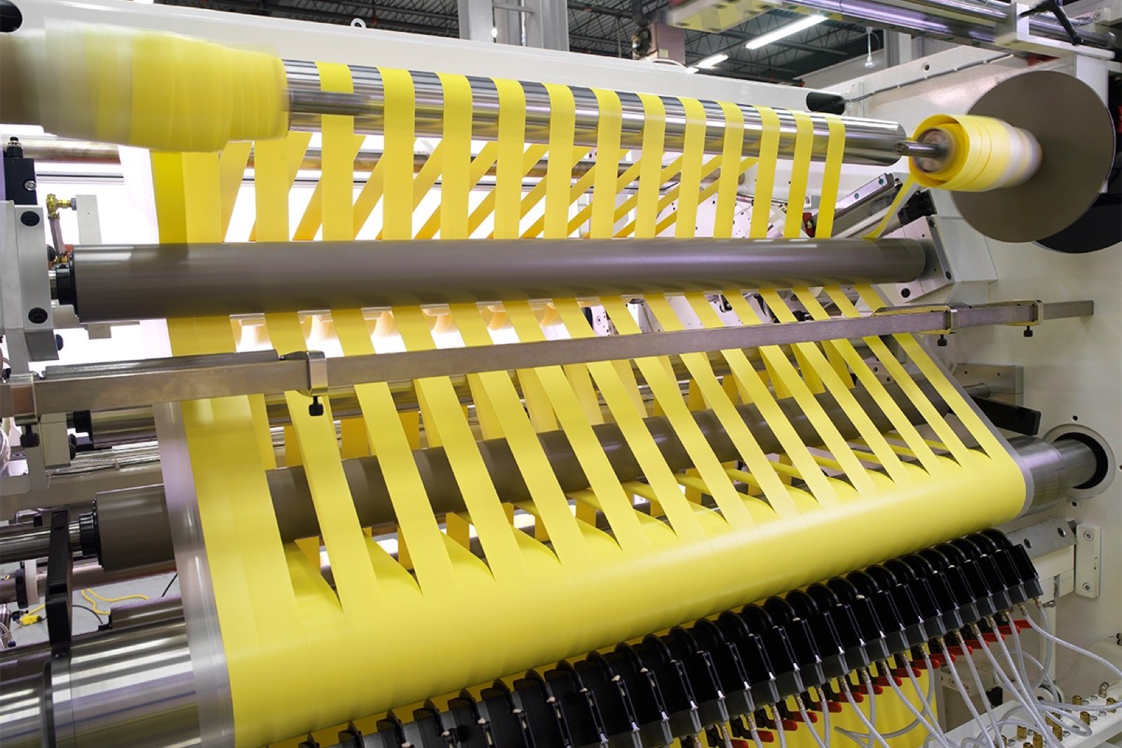 Duplex slitter-rewinder showing two output shafts