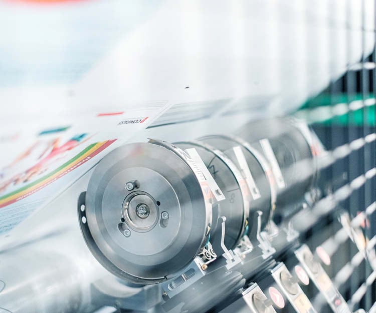 Wide shot of a slitter-rewinder in operation